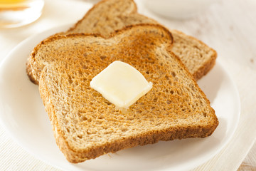Fototapeta na wymiar Whole Wheat Buttered Toast
