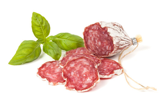 Salami sliced on the white background