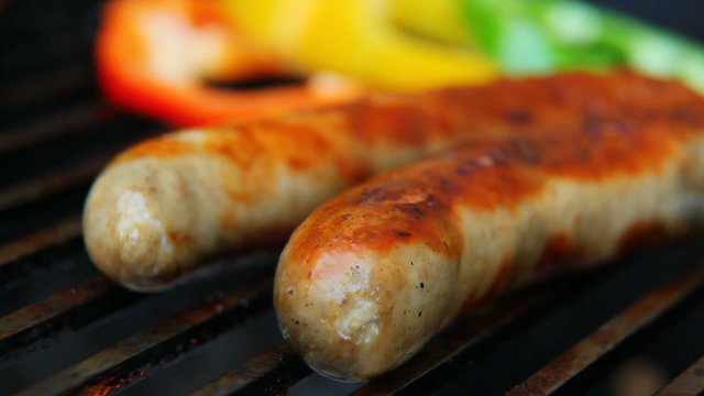 german sausages grilled on fire.