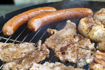 barbecue with delicious grilled meat on grill