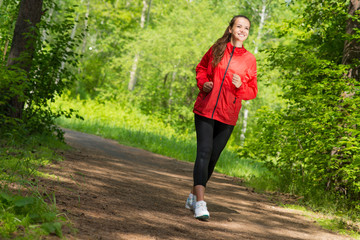 healthy young female athlete running