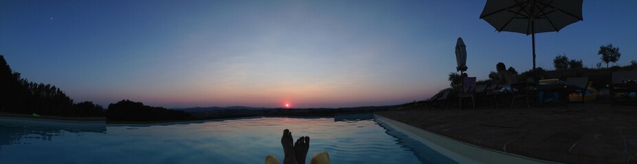 enjoying sunset on the swimmingpool
