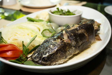 snake-head fish steamed with soy sauce and chili sauce