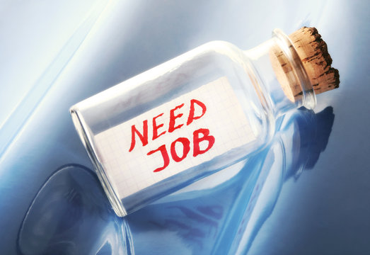 Employment concept of a bottle with a message "Need job"