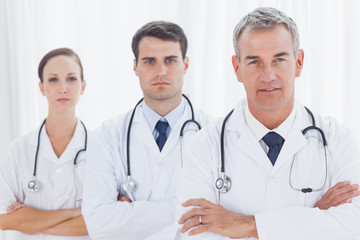 Fototapeta premium Serious doctors posing together