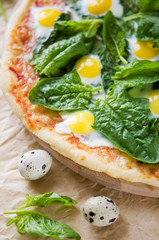 Pizza with spinach and eggs