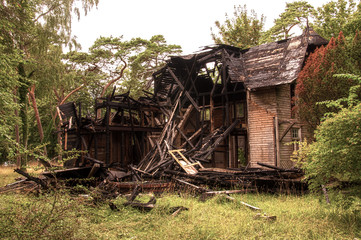 Burnt old wooden house
