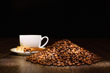 Coffee beans and white cup