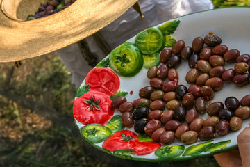 brown olives harvest in mediterranean plate