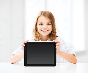 girl with tablet pc at school