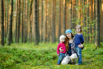 Young mother and her two little daughters