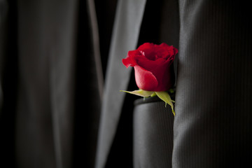 Groom with rose on the jacket