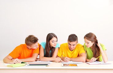 Group of young students sitting in the room