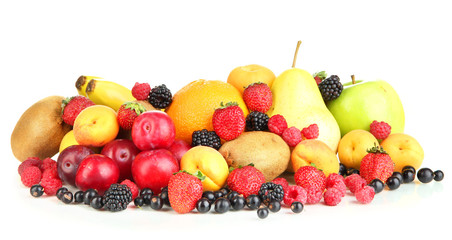 Fresh fruits and berries isolated on white