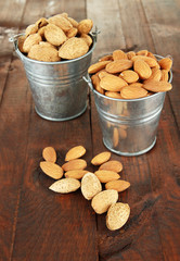 Almond on wooden background