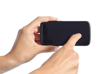 Woman hands touching the screen of a smartphone