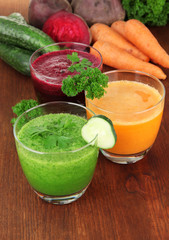 Fresh vegetable juices on table close-up