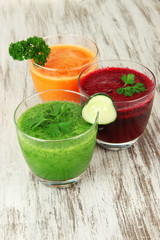 Fresh vegetable juices on table close-up