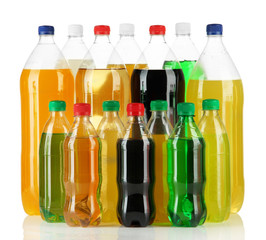 Assortment of bottles with tasty drinks, isolated on white