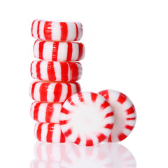 Fototapeta na wymiar Peppermint candy tower isolated on white