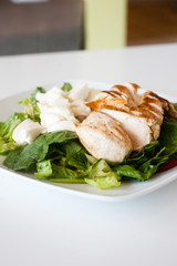 plate of fresh chopped grilled chicken salad