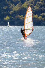 Windsurfer on Cavédine lake-Trento-color image