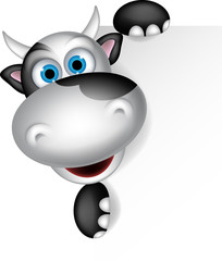 cute cow cartoon posing with blank sign