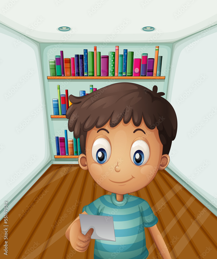 Wall mural a young boy in front of the bookshelves