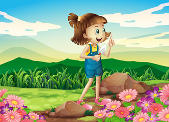 Fototapeta na wymiar A girl holding a shovel at the flower garden
