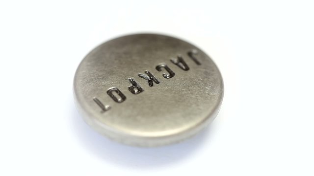 Jackpot button rotating on white background