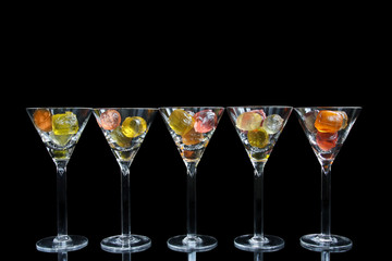 Cocktail glasses with colorful fruit gelatine