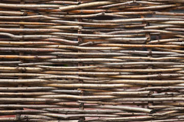 Background of interwoven wooden bars