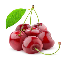 Isolated cherries. Pile of sweet cherry fruits with stems and leaf isolated on white background