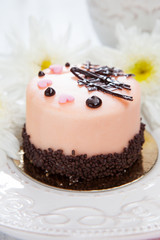 Sweet cake on a white wooden table
