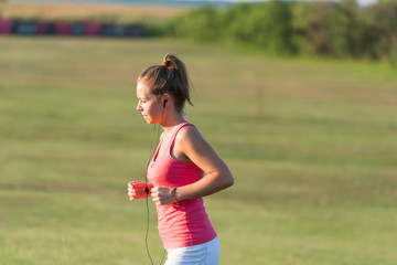 girl jogging in nature