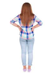 Fototapeta premium back view of standing beautiful red head woman.
