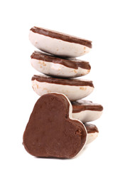 Stack of heart shape chocolate meringues.