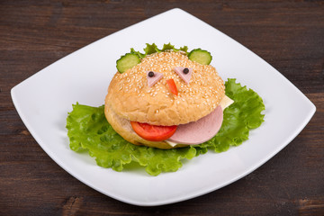 Fun food for kids - hamburger looks like a funny muzzle