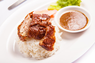 a perfect golden brown roast duck with rice