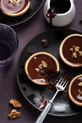 tartelettes with chocolate ganache and walnuts