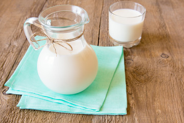 Milk on wooden table