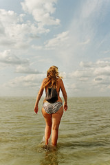 Fototapeta na wymiar Woman on the beach.