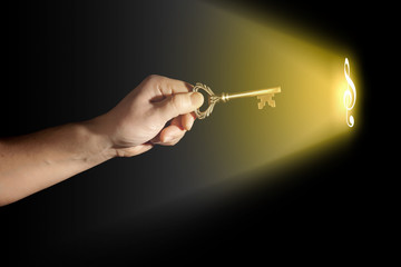 Hand with key