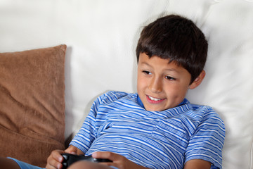 Young boy playing computer game