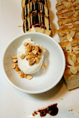 Coconut ice cream in a white cup.