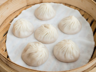 Fototapeta na wymiar Xiao Long Bao - Shanghai style steamed pork dumplings