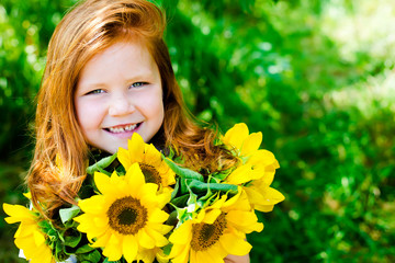 Red hair girl in the park © mariiya