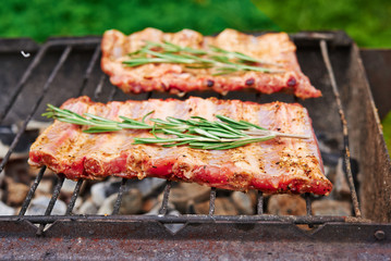 raw pork's ribs on grill
