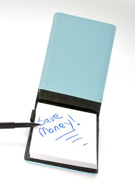 Note pade written the words save money