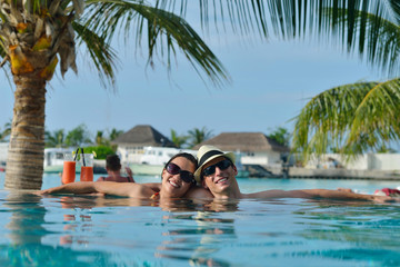 happy young couple relax and take fresh drink